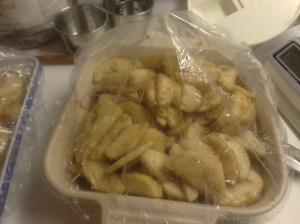 Shower cap covering dough & apples