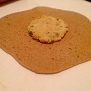 Pull up the sides to make a purse and then flatten, roll thin.